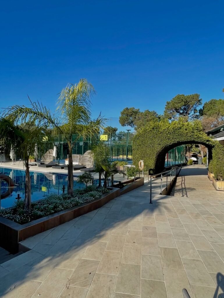 Glass-walled padel courts at Royal Tennis Club Marbella in El Rosario, East Marbella