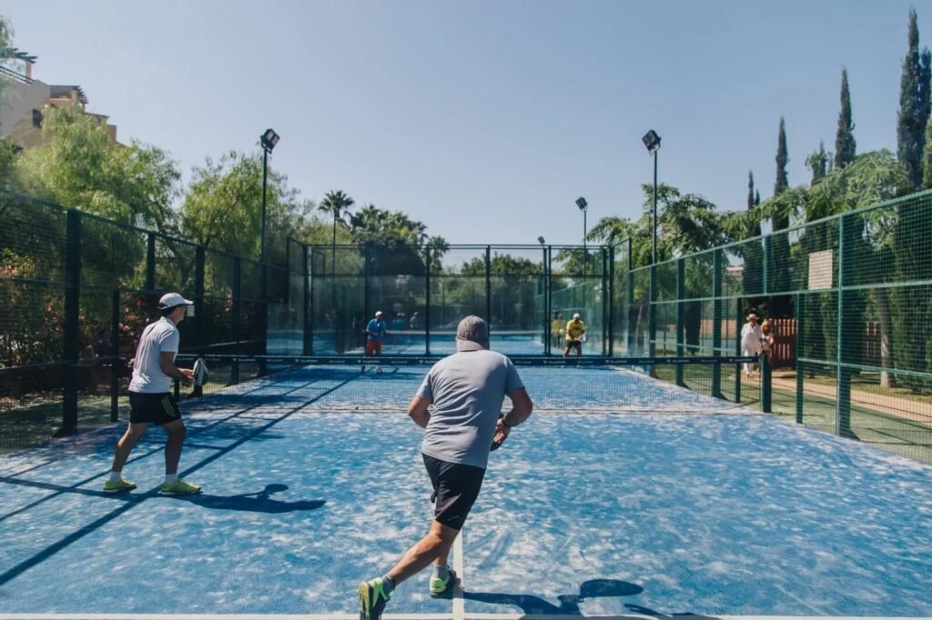 Players on a padel court at Villa Padierna Racquet Club on the New Golden Mile